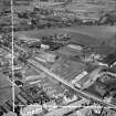 Cruikshank and Co, Ltd, Denny Iron Works, Mydub, Denny, Stirlingshire, Scotland, 1950. Oblique aerial photograph taken facing north-east.  This image has been produced from a crop marked negative.
