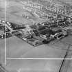 Cruikshank and Co, Ltd, Denny Iron Works, Mydub, Denny, Stirlingshire, Scotland, 1950. Oblique aerial photograph taken facing north-west.  This image has been produced from a crop marked negative.