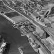 Glasgow, general view, showing Robinson Dunn and Co. Ltd. Partick Saw Mills and Meadowside Granary, Linthouse, Govan, Lanarkshire, Scotland, 1930.  Oblique aerial photograph taken facing north-west. Oblique aerial photograph  taken facing north west.