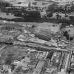 Robinson Dunn and Co. Ltd. Temple Saw Mills and Forth and Clyde Canal, New Kilpatrick, Dunbartonshire, Scotland, 1930.  Oblique aerial photograph taken facing north-west.