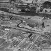 Robinson Dunn and Co. Ltd. Temple Saw Mills and Fulton Street, New Kilpatrick, Dunbartonshire, Scotland, 1930.  Oblique aerial photograph taken facing north. This image has been produced from a damaged negative.