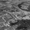 Robinson Dunn and Co. Ltd. Temple Saw Mills and Forth and Clyde Canal, New Kilpatrick, Dunbartonshire, Scotland, 1930.  Oblique aerial photograph taken facing north-west. This image has been produced from a damaged negative.