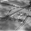 Glenboig Union Fireclay Co. Cumbernauld Fireclay Works, Cumbernauld, Dunbartonshire, Scotland, 1930.  Oblique aerial photograph taken facing east.