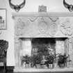 Kilravock Castle. Reconstructed fireplace in front hall and finial, perhaps from tomb effigy.