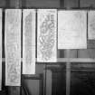 Photographic copy of six rubbings. The middle two rubbings shows unidentified carved stones and the two rubbings to the right are of stones located in the Whithorn Museum. The two rubbings on the left depict sections of the Camus's Cross. 

