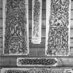 Photographic copy of five rubbings. The upper left and right rubbings show the face and reverse of the Closeburn cross. The remaining stones are unidentified.