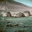 A general view of a St Kilda blackhouse (R) flanked by two cleitean (78 and 79).