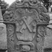 Detail of headstone to Henry Kedslie showing flesher and tools,Tranent Parish Church Burial Ground.