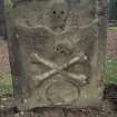 View of headstone to William Stevenson d.1776 with symbols of motality, St Ninian's Churchyard, Lamington.