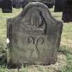 View of headstone 1721 showing tailors hand with iron and shears, Lesmahagow  Parish Churchyard.