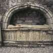 View of tomb with effigy and carvings, St Mary's Churchyard, Rothesay.