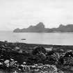 St Kilda Village, The Bay.
General view from North West across bay with boat at anchor, including Store, School, Church and Manse in distance.