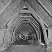 Fernaig cruck-framed barn, interior.
General view of beam structure from South.
