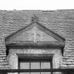 Detail of central dormer on W wing (outside).