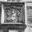 Detail of heraldic panel on E wing.