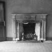 Interior. Detail of fireplace in telling hall