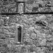 St Clement's Church, Rodel. View of sculpture on W face of tower.
