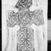 Photographic copy of rubbing showing the face of a Pictish cross slab in Logierait churchyard.