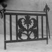 View of wrought iron gate with thistle motif, possibly made for the main spiral staircase at Ardkinglas House