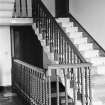 Interior view of Dalserf House showing detail of staircase.