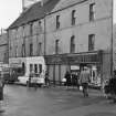 View of 1-3, 5, 7 and 9 High Street, Thurso, from south west, showing Lipton's shop.