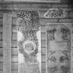 Photographic copy of five rubbings. The upper and bottom right rubbings show a cross slab in St Serf's Church, Dunning and the middle rubbing shows the Winwick cross in St Oswald Church, Cheshire. The other two stones has not been identified.