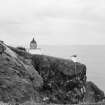 View of St Abbs Head Lighthouse and rock.