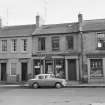 View from north west of High Street, Coldstream, showing Geo W Gibson & Sons Commercial Printers and Stationers and R Scott & Son Booksellers