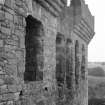 Detail of window openings/corbel course at north range, Crichton Castle