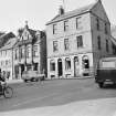 View of Market Square, Duns, from south showing Working Men's Institute and the East Lothian Co-operative Society Ltd