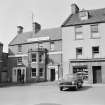 View of 31-34 Market Square, Duns, from south showing White Swan Hotel and D Porter and Son Jewellers and Opticians