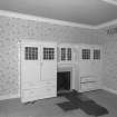 First floor, bedroom, fireplace with fitted cupboard surround, detail
