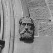 Detail of carved stone head.