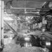 Interior view in the foreground of the Recovery Basement, with the Affination Basement seen in the background.  The Basements contained various equipment associated with the main Recovery and Affination Stations (T&L No.: 21177/9)
