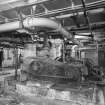Interior view of Carbonation and Recovery Basement, showing the Carbon Dioxide Gas Compressors which supplied the gas for the Carbonation Plant Saturators.  The Carbon Dioxide was supplied from the flue gases from the refinery's main boilers (T&L No.: 21177/11)