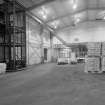 Interior view of the Warehouse, with the 25kg and 50kg bag ISV Palletiser in the background (T&L No.: 21185/3)