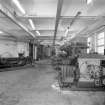 Interior view within Refinery Engineering Workshop, showing the Engineering Department Machine Shop, used for the maintenance of the refinery plant and equipment (T&L No.: 21184/5)