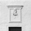 Isle of May.  The Beacon.  Detail of carved panel above entrance doorway in South front.