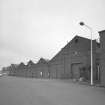 Motherwell, Craigneuk Street, Anderson Boyes
Exterior view from south west of machine shop bays, the nearest bays (right) dating from the opening of the works in 1899, the further bays originating from a sequence of expansions in 1912, 1922, 1924 and 1954