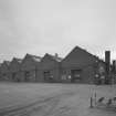Motherwell, Craigneuk Street, Anderson Boyes
Exterior general view of detached block of new Machine Shops occupying east side of works (nearer lower bays built 1942, further bays built in 1962)