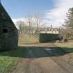 General view of farmhouse and walled garden from East.