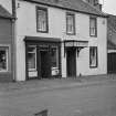 View of the Crown Hotel on Victoria Street, Kirkpatrick Durham, from south west