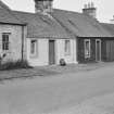 General view of north side of Victoria Street, Kirkpatrick Durham, from south west