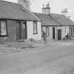 View of north side of Victoria Street, Kirkpatrick Durham, from south west