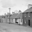 View of south side of Victoria Street, Kirkpatrick Durham, from north west