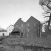 General view of mill from SSE, showing water wheel house.