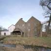 General view of mill from SSE, showing water wheel house.