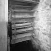 Detailed view of wooden buckets of the low-breast water wheel, 15 ft diameter.