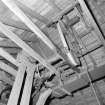 Interior.
View of roof space showing sack-hoist mechanism.