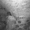 Interior.
Detail within kiln, showing base of brick-built kiln invert above rubble-built firebox.